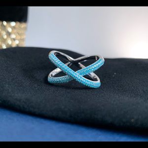 .925 Sterling silver ring with turquoise blue CZs